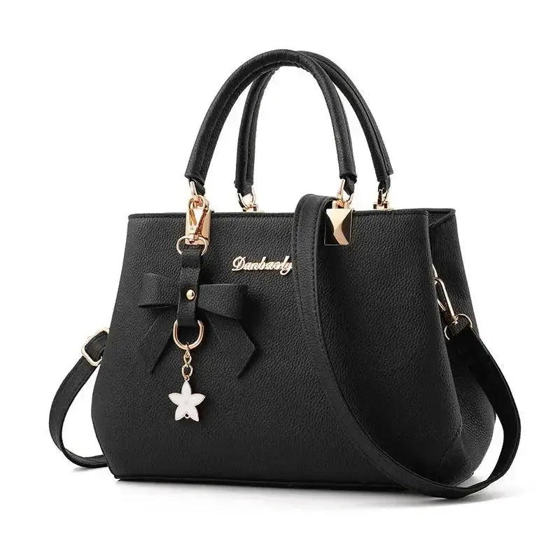 Elegant women's shoulder bag with flower pendant MAWIS