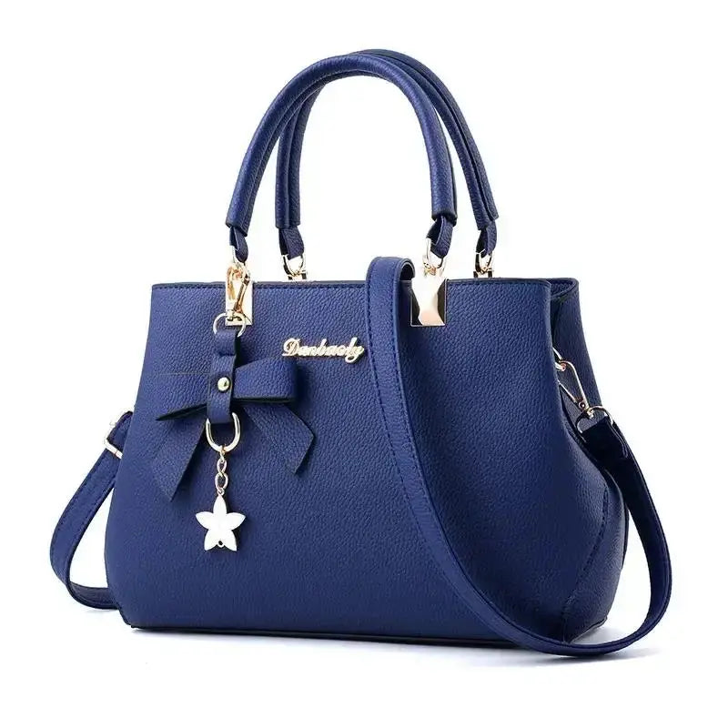 Elegant women's shoulder bag with flower pendant MAWIS