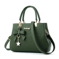 Elegant women's shoulder bag with flower pendant MAWIS